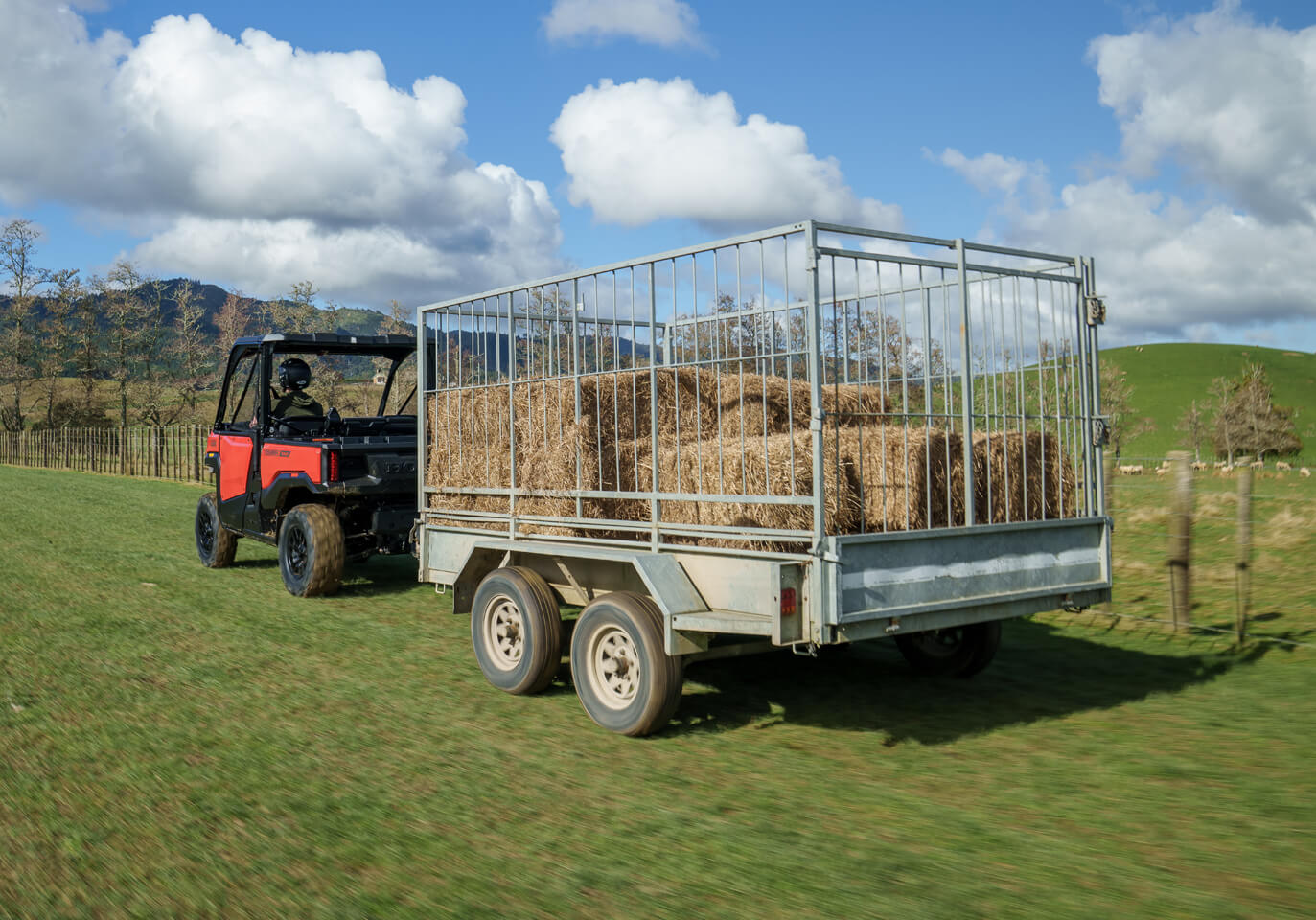 Pioneer 1000 towing a loaded trailer